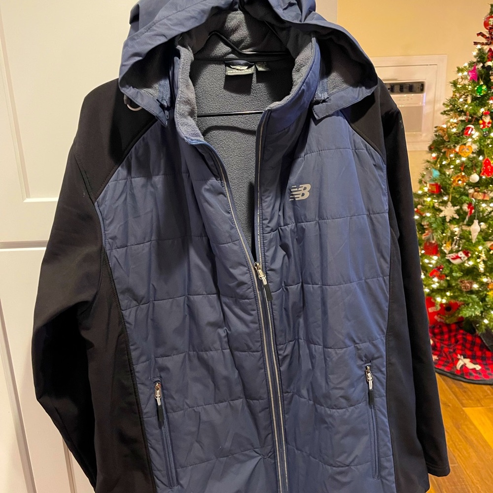2XL NEW BALANCE PUFFER JACKET IN GOOD USED CONDITION.
